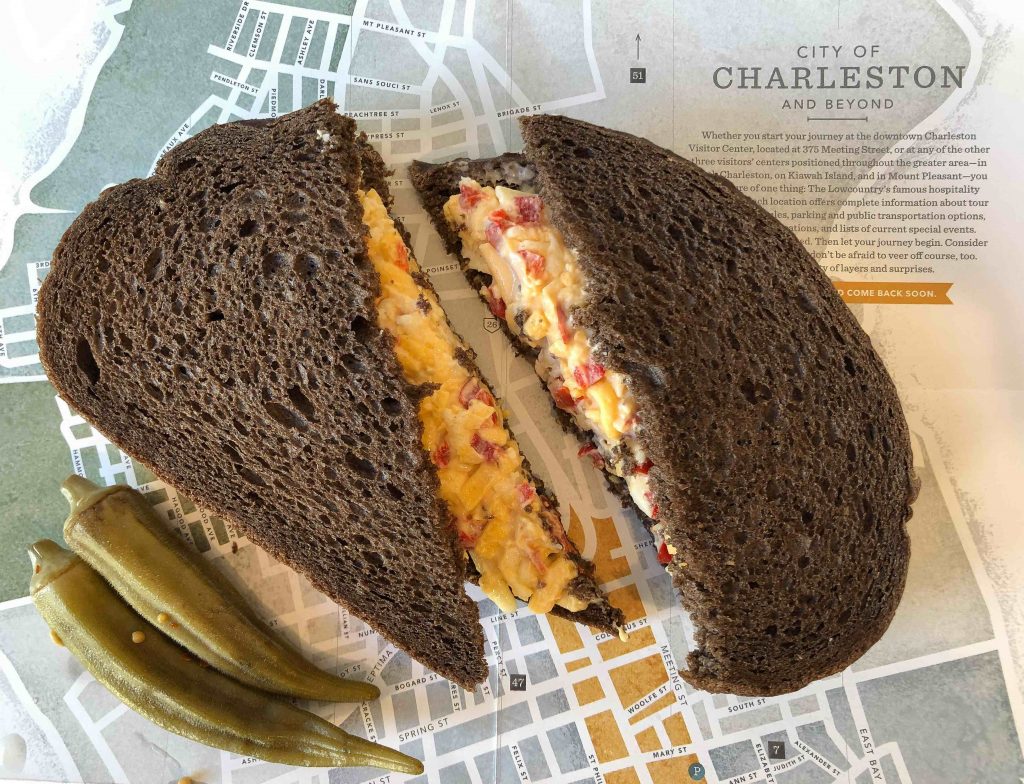 pimento cheese sandwich on dark rye bread on Charleston map