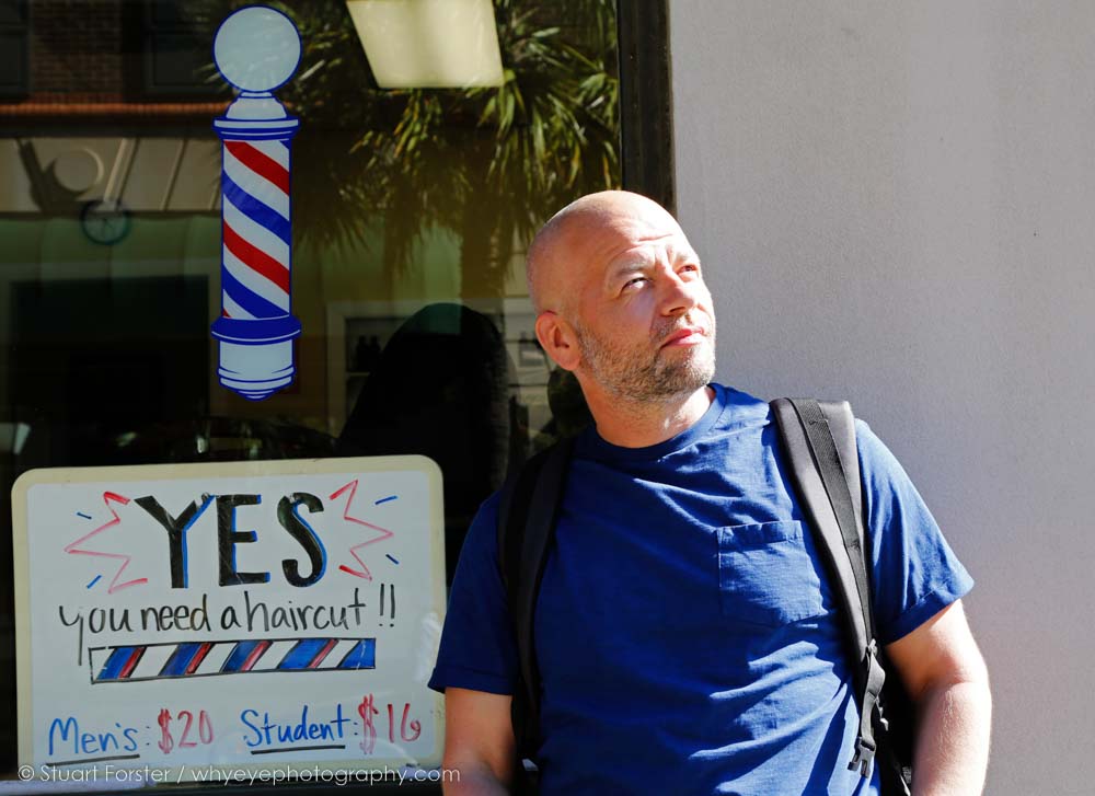 A member viewing a historic facade in downtown Charleston during the 2019 British Guild of Travel Writers AGM